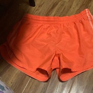 Orange swim shorts